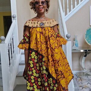 African print midi dress with rafia collar.